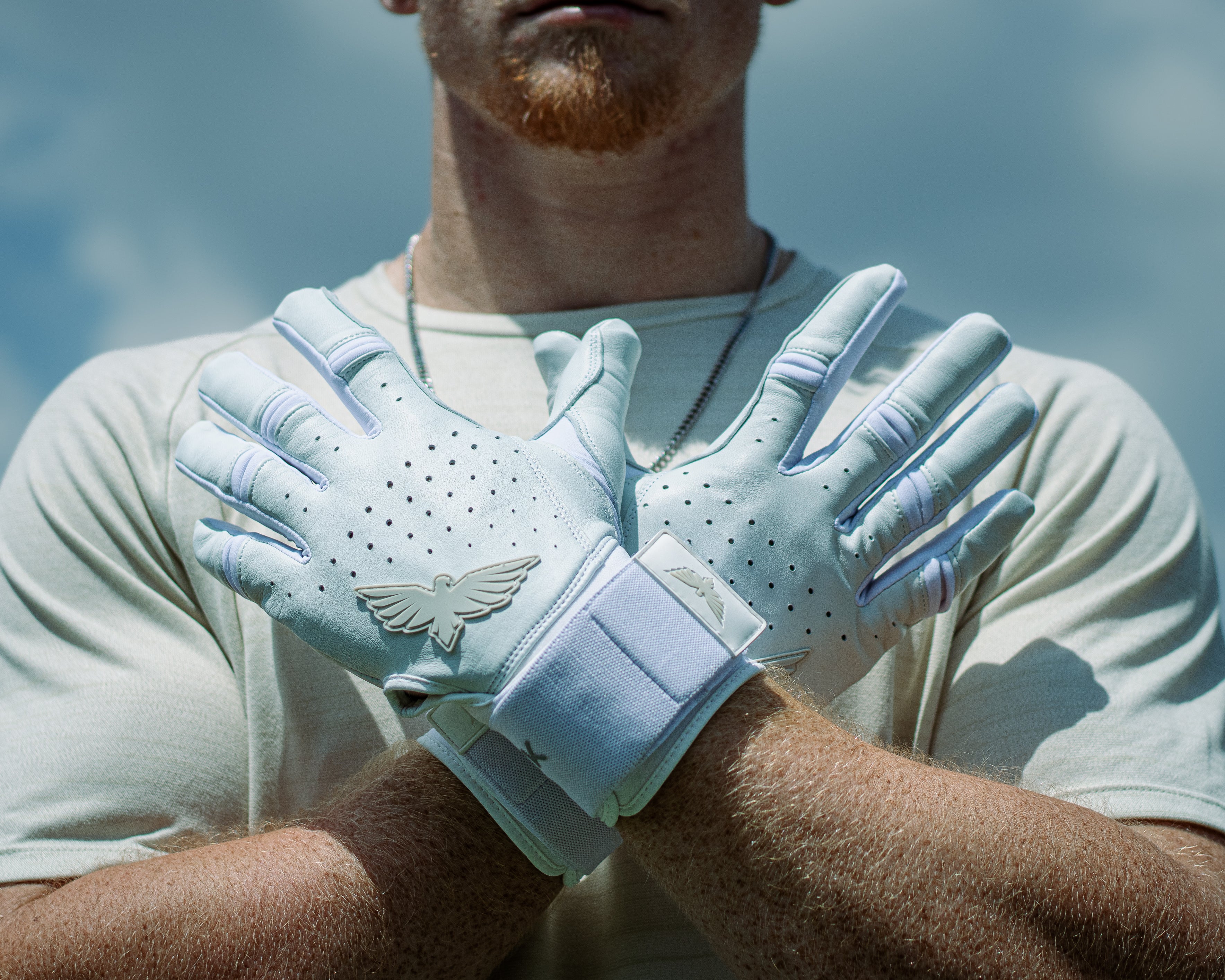 Beautiful white pro batting gloves on a baseball player