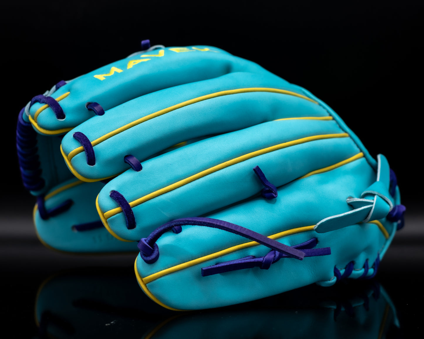aqua blue glove with yellow piping and purple laces